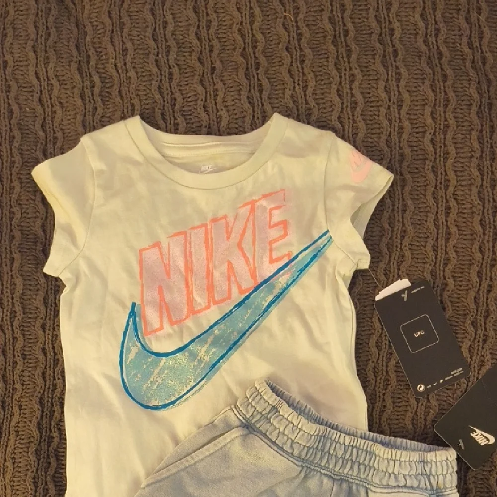 Nike Kids White Tee with Pink and Blue Graphic - Picture 1 of 5